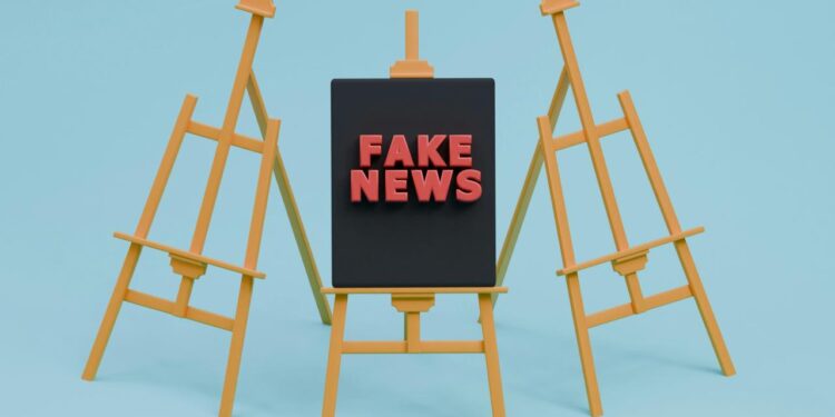 tanda berita palsu yang duduk di atas kuda-kuda